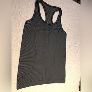 Lululemon tank top. Black/white stripes. Size 6